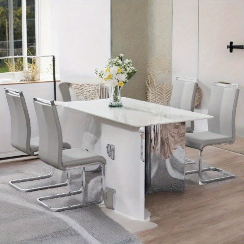 Dining Table and Chair Set. 1 Rectangular Table with White Imitation Marble Tabletop and Silver Metal Legs, Paired with 6 Black PU Chairs with Silver Legs. Model DT-1544 C-008. Stylish and Durable Furniture for Your Home.
