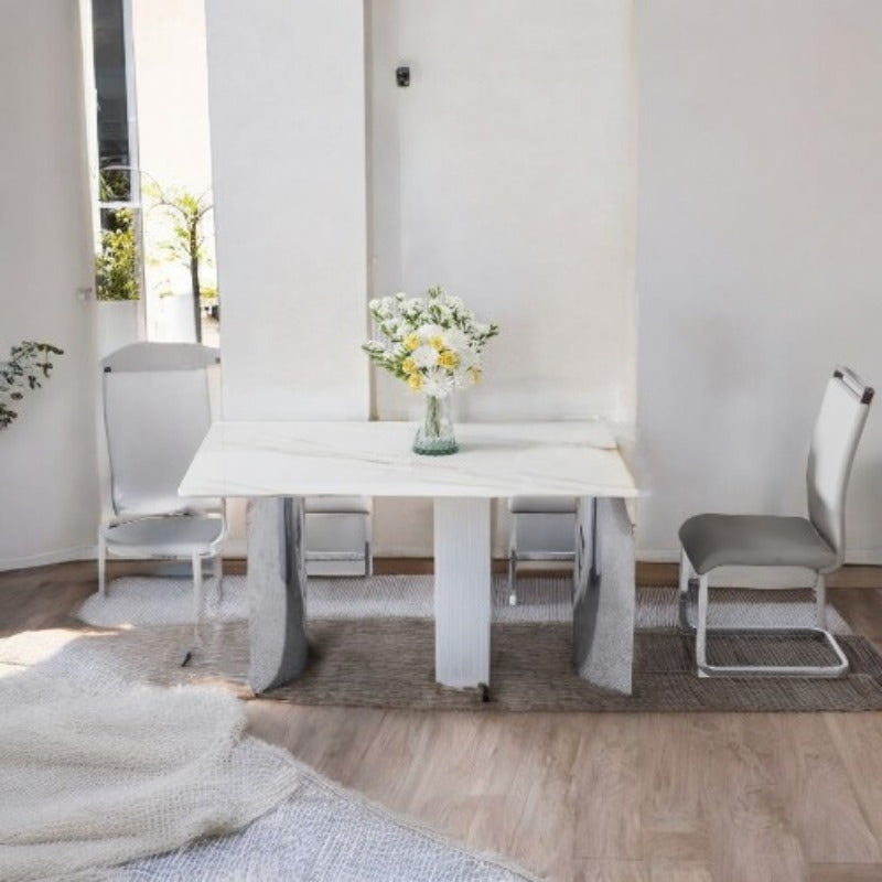 Dining Table and Chair Set. 1 Rectangular Table with White Imitation Marble Tabletop and Silver Metal Legs, Paired with 6 Black PU Chairs with Silver Legs. Model DT-1544 C-008. Stylish and Durable Furniture for Your Home.
