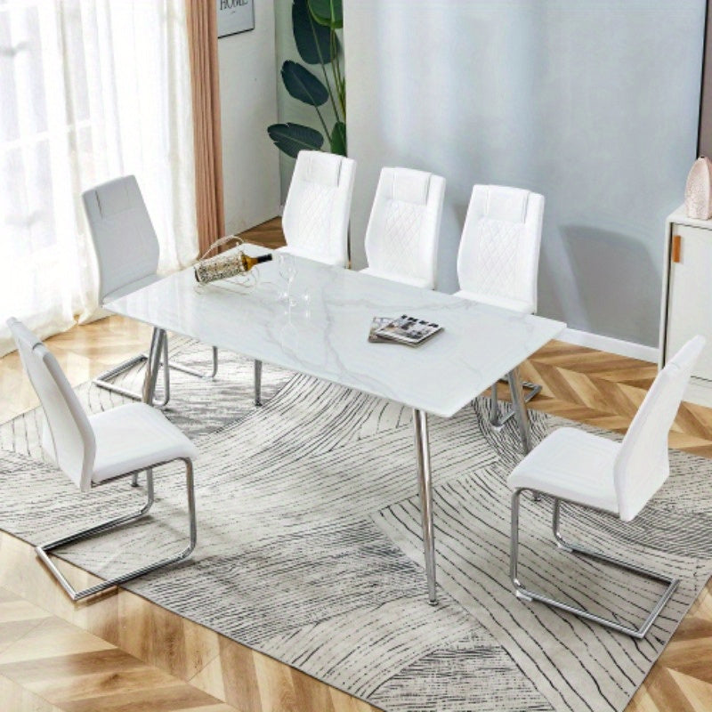 Table and chair set. 1 table and 6 white chairs. Rectangular dining table, 0.4 white imitation marble tabletop, silver metal table legs. Paired with 4 white chairs 1544 001