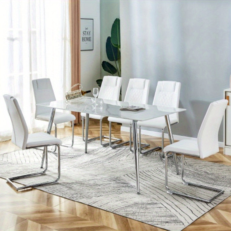 Table and chair set. 1 table and 6 white chairs. Rectangular dining table, 0.4 white imitation marble tabletop, silver metal table legs. Paired with 4 white chairs 1544 001